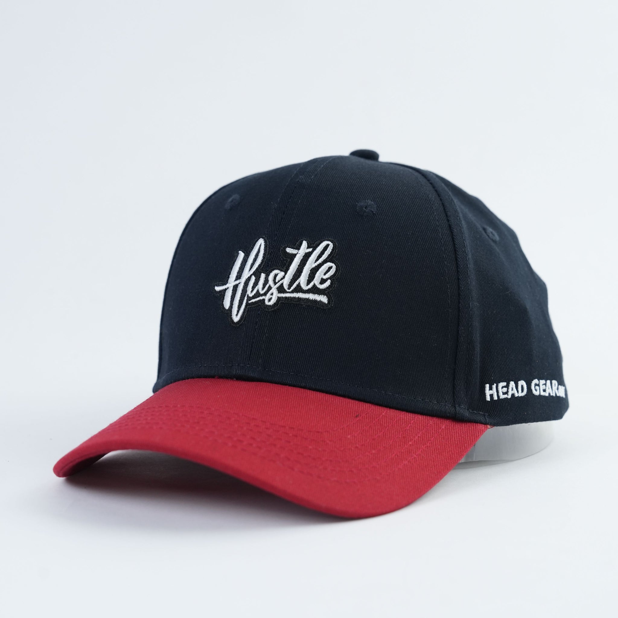 Head Gear AU “Hustle” Cap – Black Cotton / Red Visor